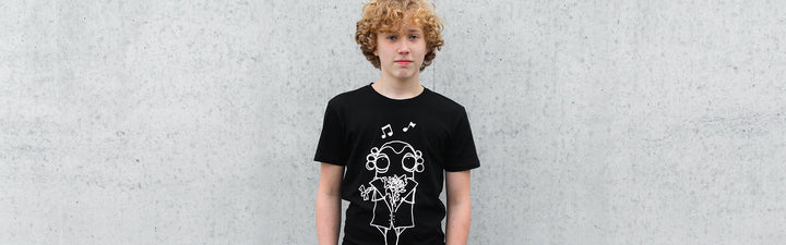 Teenage person with black Quipster Mozart t-shirt